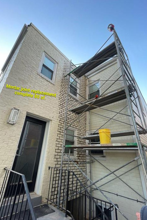 scaffolding in front of a house